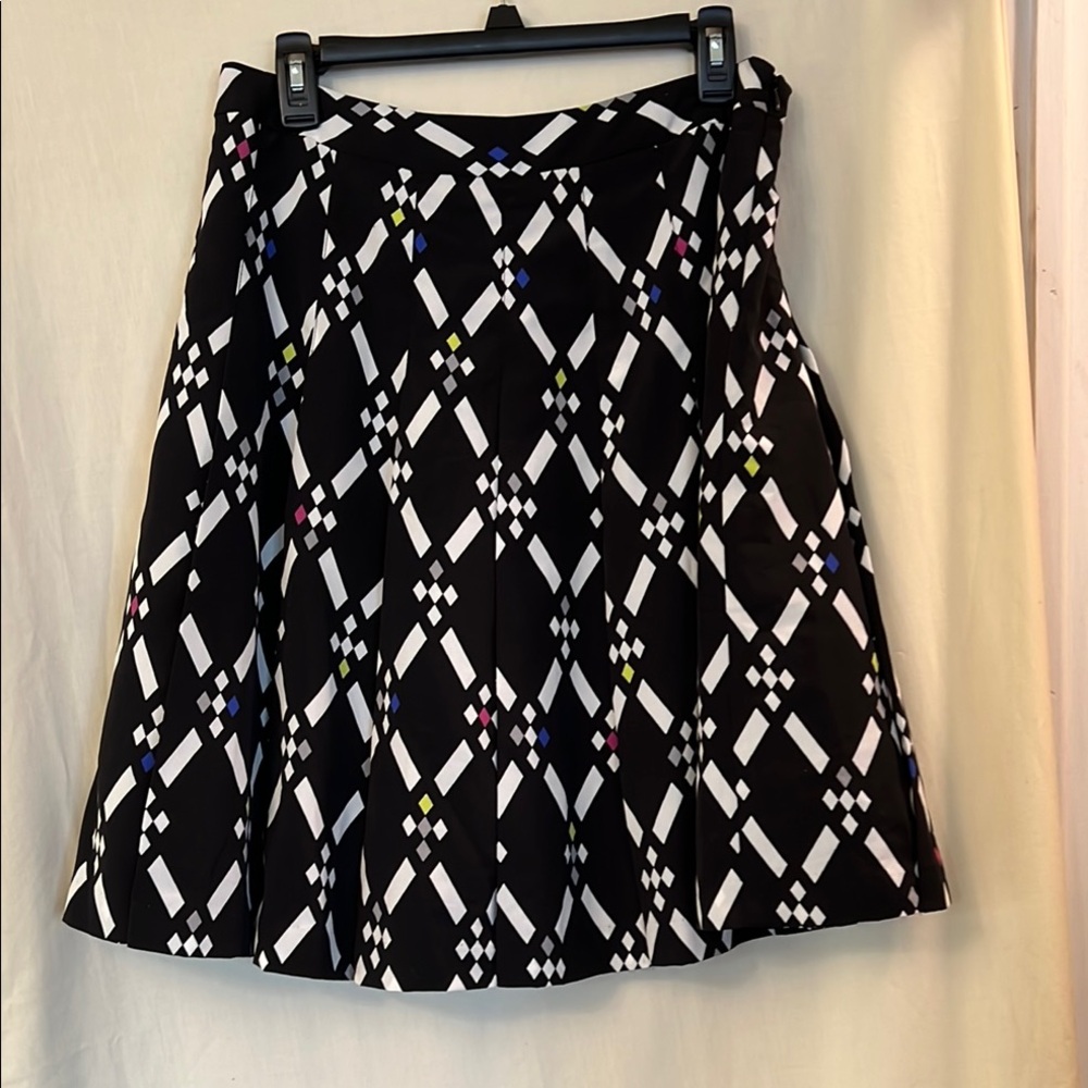 Pleated lined skirt. Black n white w colored little diamonds. NWOT